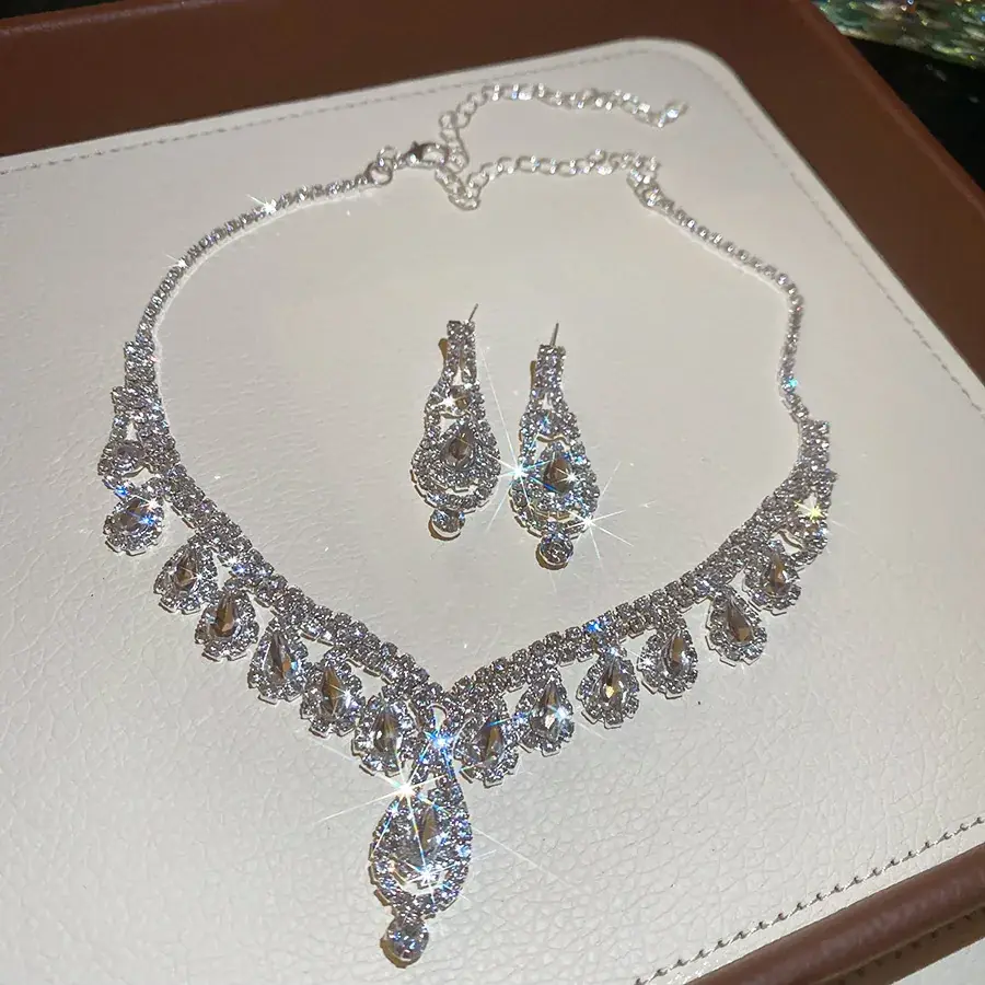 Water drop tassel necklace and matching earrings with sparkling crystals